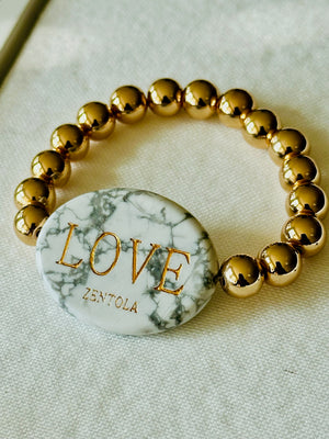 Howlite with Gold Hematite Band