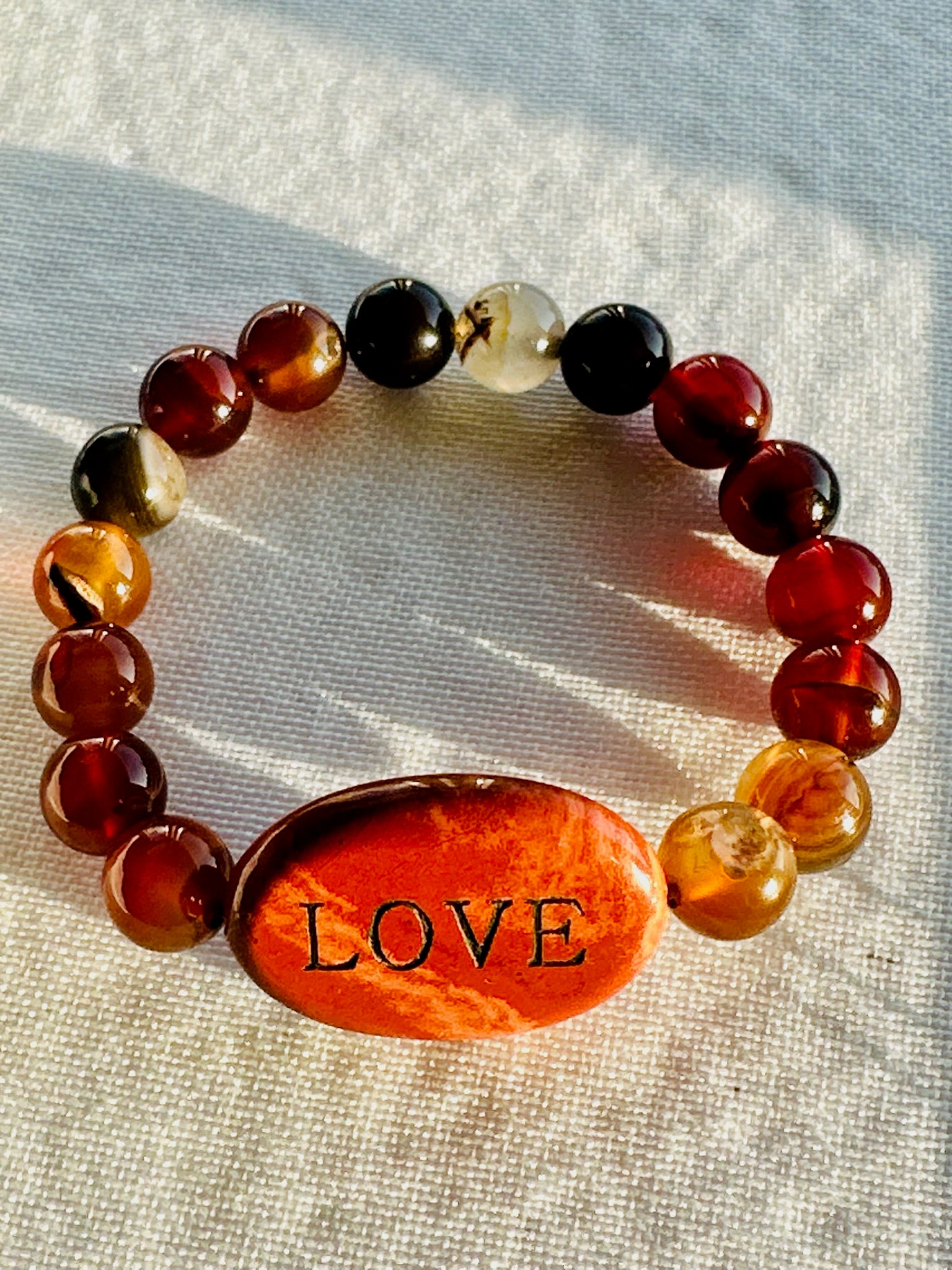Red Jasper with dream agate band